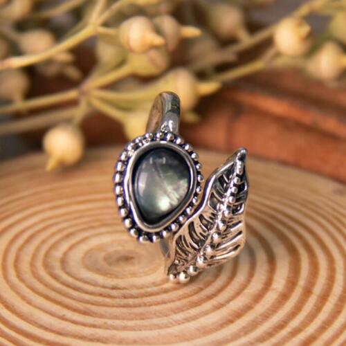 Elegant bypassring med månsten och filigranbladdesign